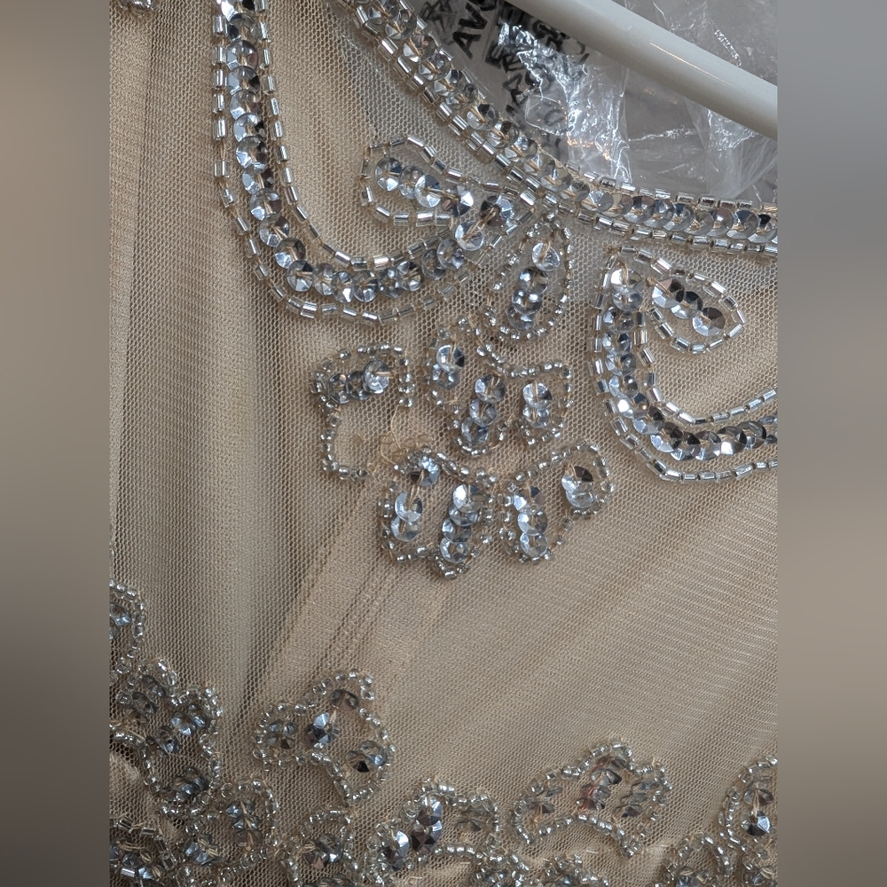 Elegant Cream Sleeveless Dress - Picture 9 of 11